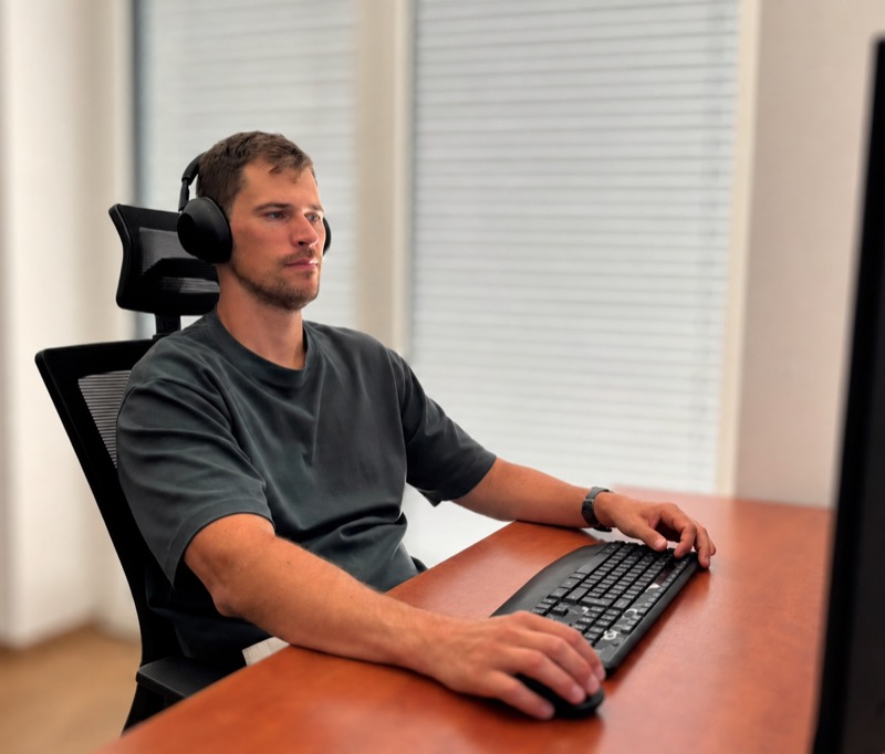 Tibor working at his desk